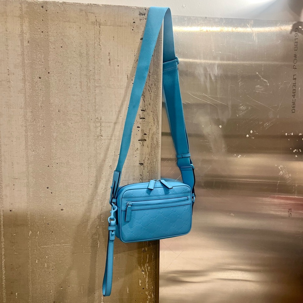 $2600 Gucci GG Logo Embossed Rubberized Leather Bag